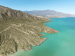 Lujan De Cuyo Prints: Aerial view of the shores of the Potrerillos Lake Dam