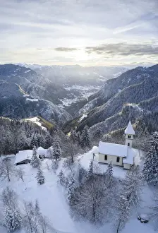 Massif Prints: Aerial view of the Silvestri church and the Scalve valley after a winter sunrise