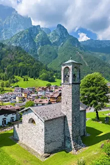 Foothills Prints: Aerial view of the small church called Cesul√¨ in Colere town with view of the north face of the Presolana mountain