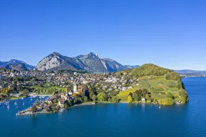 Hans Georg Eiben Collection: Aerial view on Spiez and Lake Thun, Berner Oberland, Switzerland
