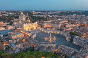 Dome Prints: Aerial view of St. Peter Basilica at dusk. Vatican city, Rome, Lazio, Italy