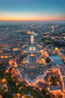 Dome Prints: Aerial view of St. Peter's Basilica at dusk. Vatican city, Rome, Lazio, Italy