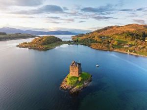 Tide Prints: Aerial view of Stalker Castle during sunset