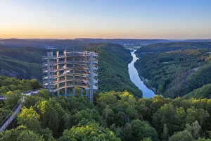 Aerial view on the sunrise above the Baumwipfelpfad, treetop walk at the Grand Saar Aerial view on the sunrise above the Baumwipfelpfad, treetop walk at the Grand Saar