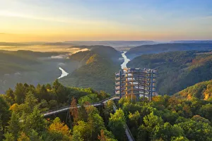 Aerial view on the sunrise above the Baumwipfelpfad, treetop walk at the Grand Saar