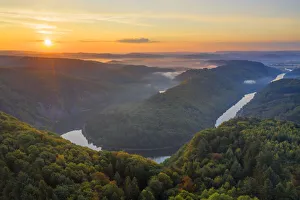 Saarland Prints: Aerial view on the sunrise at the Grand Saar horseshoe bend, Orscholz, Saarland, Germany