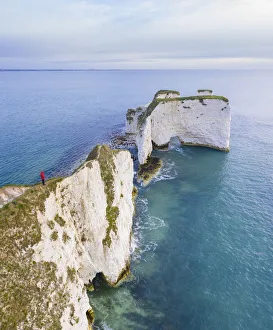 Aerial view at sunrise of the Old Harry Rocks, chalky formations near Handfast Point