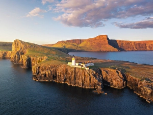 Basalt Prints: Aerial view during sunset at Neist Point lighthouse