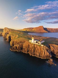 Basalt Prints: Aerial view during sunset at Neist Point lighthouse