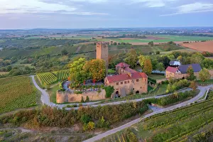 Viticulture Prints: Aerial view of the sunset above Ravensburg castle near Sulzfeld