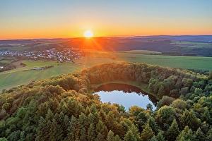 Volcano Prints: Aerial view on the sunset above Windsborn volcanic crater lake