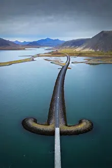 Vesturland Prints: Aerial view of the sword shaped bridge Snæfellsnesvegur close to the town of Grudarfjordur