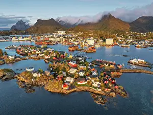 aerial view taken by drone of a car driving along the bridge in Svolvaer, famous fisherman's village in Lofoten Island, Norway, Europe