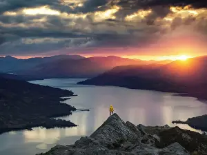 Cloud Prints: Aerial view of a tourist a t Ben A'an summit during summer with the view of Loch Katrine