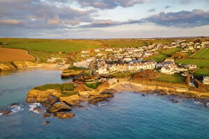 Images Dated 28th May 2021: Aerial view of Trevone Bay, beach and village in evening sunlight, Trevone, Cornwall