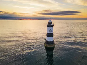 Roof Prints: Aerial view of Trwyn Du Lighthouse at sunset