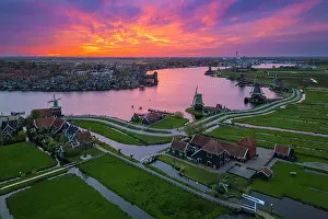 Canal Prints: Aerial view of the typical windmills of Zaanse Schans on the river Zaan in spring