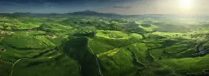 Crop Prints: Aerial view of the whole Val d'Orcia during a late spring afternoon in Tuscany, Italy