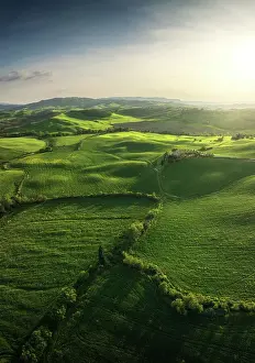 Produce Prints: Aerial view of the whole Val d'Orcia during a late spring afternoon in Tuscany, Italy