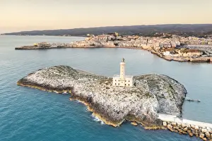Gargano Prints: Aerial view of Vieste lighthouse on Sant Eufemia islet by the sea, Foggia province