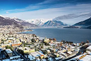 Lake District Prints: Aerial view of the village of Dongo covered with snow, Lake Como, Lombardy, Italy