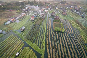 Floating Prints: Aerial view of village and floating gardens before sunrise, Lake Inle