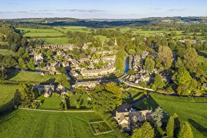 Cotswolds Prints: Aerial view over the village of Lower Slaughther in the Cotswolds, Gloustershire, England