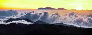 Cloud Prints: Aerial view of volcanoes at sunset