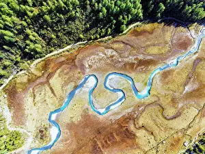 Predarossa Prints: Aerial view of the winding Duino river in autumn in Preda Rossa valley