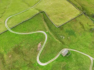 Roadway Prints: Aerial View over Windy Road & Stone Barn, Yorkshire Dales National Park, England