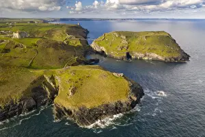 Aerial vista of Tintagel Castle and nearby Cornish coastline, Cornwall, England