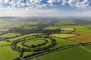 Iron Age Prints: Aerial vista of Tregeare Rounds Iron Age Hillfort surrounded by Cornish countryside