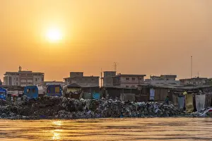 Africa, Benin, Cotonou. the backside of the famous market of Cotonou at sunset