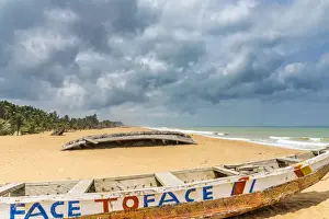 Africa, Benin, Grand Popo, coloured fishing boats on the sandy beach