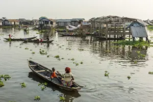 Channels Prints: Africa, Benin, Lake NokouA. Traditional wooden boats in the channels of the famous