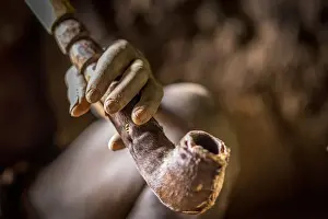 Craft Prints: Africa, Benin, Taneka Koko. a detail of the hand of the traditional healer holding