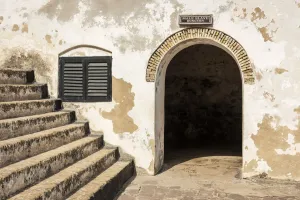 Construction Prints: Africa, Ghana, Elmina castle. entrance to the slave dungeon