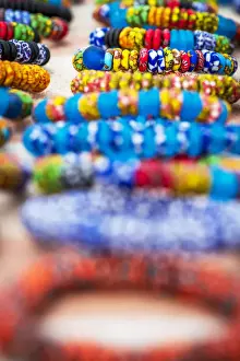 Africa, Ghana, Elmina. Handmade glass bead bracelets in Ampenyi