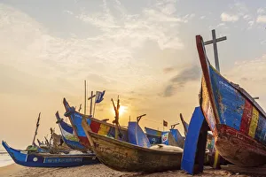Africa, Ghana, Elmina and surroundings. Traditional fishing boats on the beach in