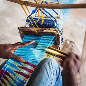 Moving Prints: Africa, Ghana, Volta Region. In the Kente weavers village