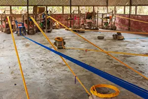 Textile Prints: Africa, Ghana, Volta Region. Looms in a factury in the Kente weavers village