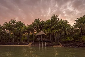 Africa, Guinea Bissau. Bijagos Islands. Sunset on Rubane Island