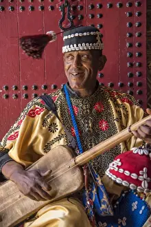 Marrakesh Prints: Africa, Morocco, Marrakesh, Medina, A gouda musician