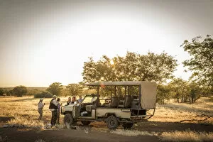 Africa, Namibia, Damara Land. Sundowner at Hobatere Lodge