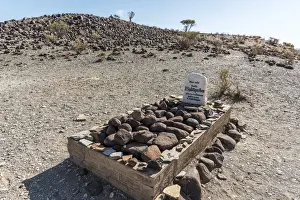 Soldier Prints: Africa, Namibia, Keetmanshop. The grave of a german soldier on the farm Mesosaurus fossil