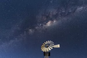 Images Dated 19th July 2018: Africa, Namibia, near Keetmanshop. Milky way with waterpump