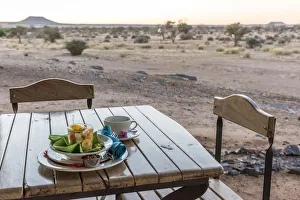 Images Dated 16th August 2018: Africa, Namibia, near Keetmanshop. Breakfast with a view