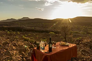 Damaraland Gallery: Africa, Namibia, Palmwag. Sundowner at the Aub Canyon