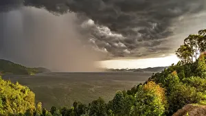 Wind Prints: africa, Rwanda, Burera Lake. View over the lake while a thunderstorm is coming