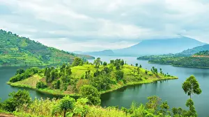 africa, Rwanda, Burera Lake. View over the lake towards volcano Muhavura